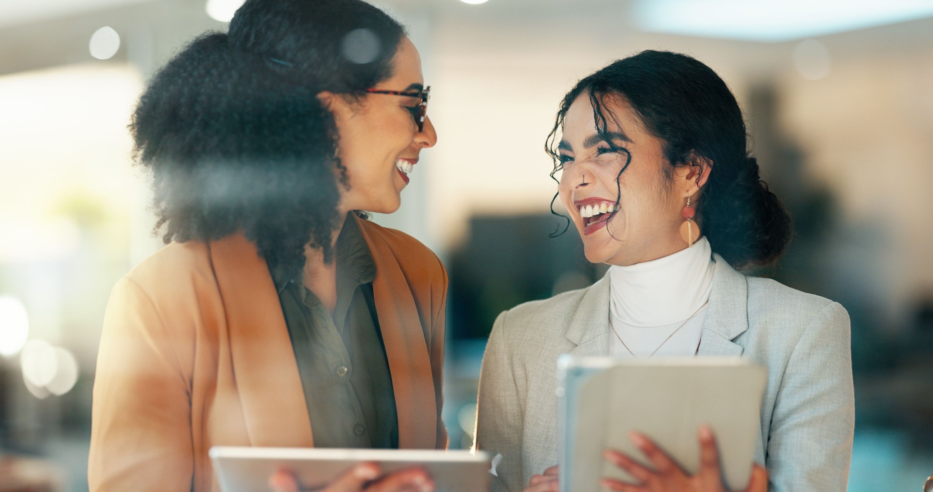 Business, smile and women with a tablet, internet and email notification with social media, typing and productivity. Happy people, consultant and manager with tech, website info and search internet